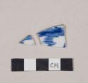 Blue hand painted porcelain body sherds; two sherds crossmend