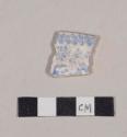 Blue transfer printed whiteware rim sherd