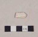 Smoked, undecorated pipe bowl fragment; crossmends with embossed pipe bowl fragment (987-22-10/105703)