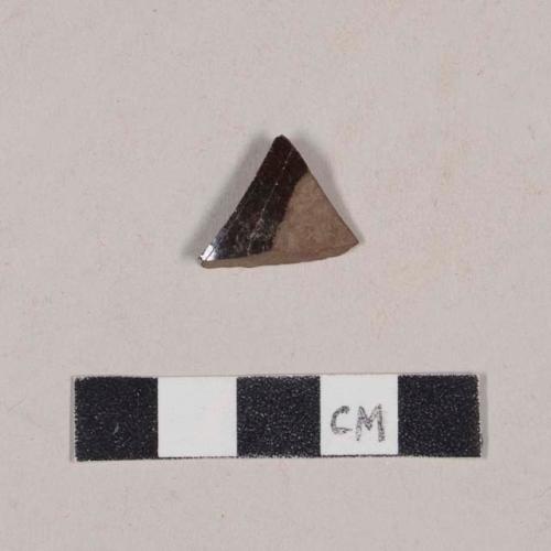 Highly fired redware body sherd, with lead glazed exterior and white slipped interior; possibly Astbury-type