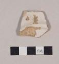 Undecorated whiteware base sherd