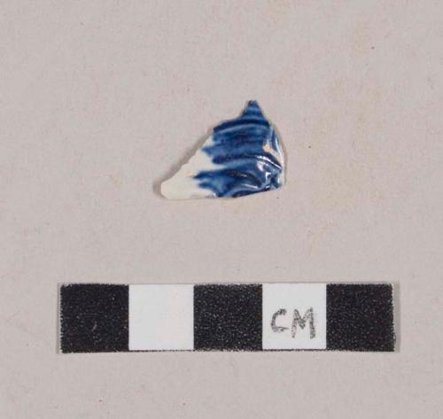 Molded, blue hand painted pearlware body sherd