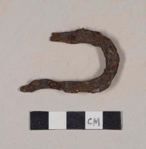 U-shaped iron fragment