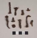 Iron nail fragments, some cut or wrought