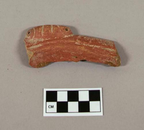 Red pottery fragment