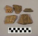 55 decorated rim potsherds