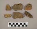 27 potsherds with incised design
