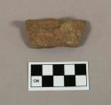 Plain rim potsherd with lug