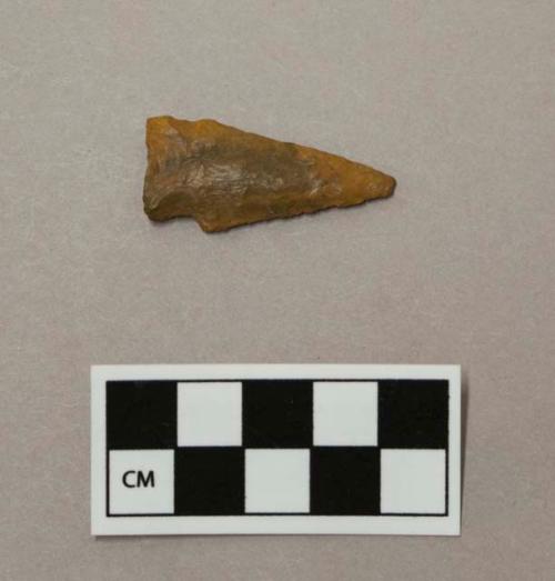 Chipped stone projectile point, side notched on one side