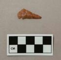 Chipped stone projectile point, side notched, part of base broken off