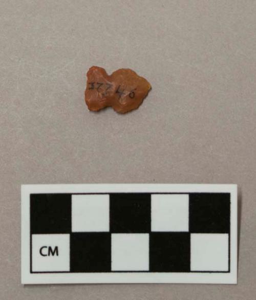 Chipped stone projectile point, side notched