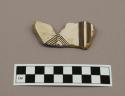 Ceramic sherd, body sherd, bowl?, black on white design interior, mended