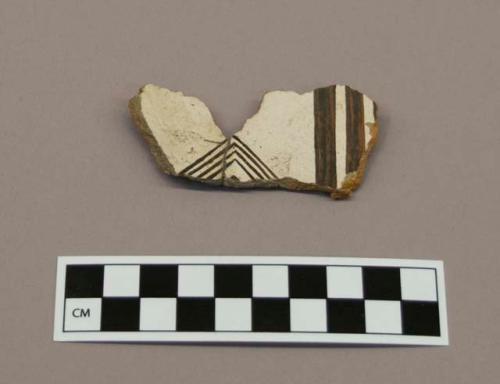 Ceramic sherd, body sherd, bowl?, black on white design interior, mended