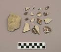 Ceramic body sherds, brown designs on white or just white exterior