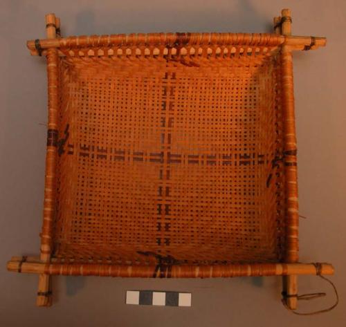 Basketry strainer, square, double wooden rim, woven cross design.