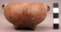 Small pottery bowl - burnished and incised; tripod feet; 2 lug handles;