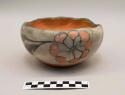 Polychrome-on-grey fluted-rim bowl: floral motif