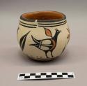 Polychrome-on-buff bowl: bird and floral motifs