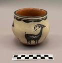 Black-on-buff jar: deer and antelope motifs