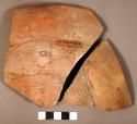 Restorable san bernardino pink potsherd with basket impression on exterior