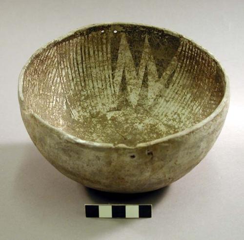 Black on white pottery bowl