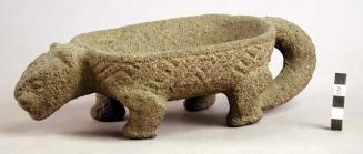 Jaguar effigy stone metate