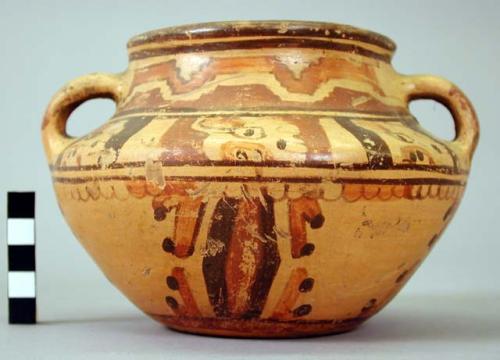 Two-handled Yojoa polychrome pottery bowl, bold anamalistic style.