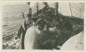 Arctic Voyage of Schooner Polar Bear - Crew on deck writing letters home