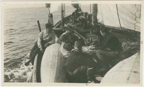 Arctic Voyage of Schooner Polar Bear - Crew on deck writing letters home