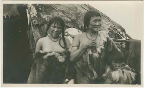 Arctic Voyage of Schooner Polar Bear - Two women and a child in fur coats