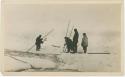 Arctic Voyage of Schooner Polar Bear - Crew cutting ice