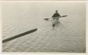 Arctic Voyage of Schooner Polar Bear - Man rowing in canoe
