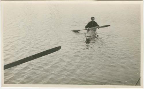 Arctic Voyage of Schooner Polar Bear - Man rowing in canoe