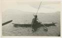 Arctic Voyage of Schooner Polar Bear - Man rowing canoe