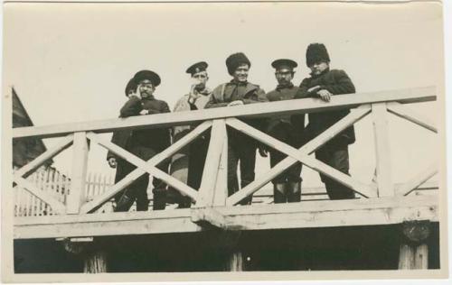 Arctic Voyage of Schooner Polar Bear - Men standing on dock