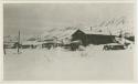 Arctic Voyage of Schooner Polar Bear - Log cabin covered in snow