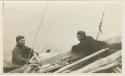 Arctic Voyage of Schooner Polar Bear - Man in canoe next to bigger boat
