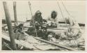 Arctic Voyage of Schooner Polar Bear - Men on deck with sled dogs