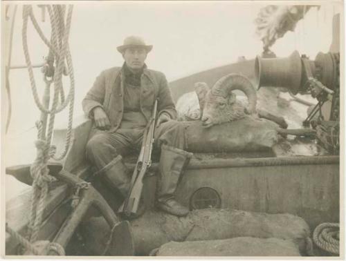 Arctic Voyage of Schooner Polar Bear - Samuel Mixter with hunting rifle and mountain sheep