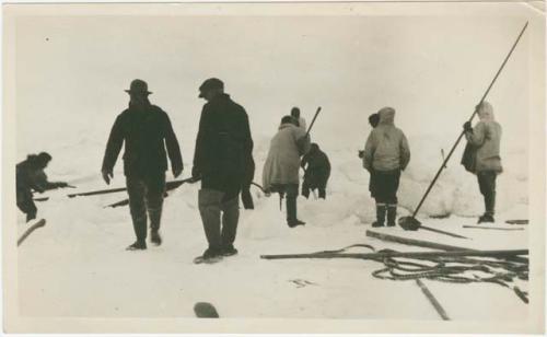 Arctic Voyage of Schooner Polar Bear - Crew cutting ice