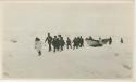 Arctic Voyage of Schooner Polar Bear - Crew pushing small boat over ice