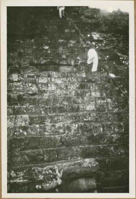 Men walking stone foundation