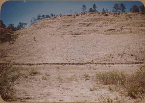 Panoramic attempt (center) to show south face from half way up trail in Tenampua