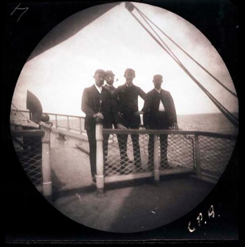 Four men on a ship