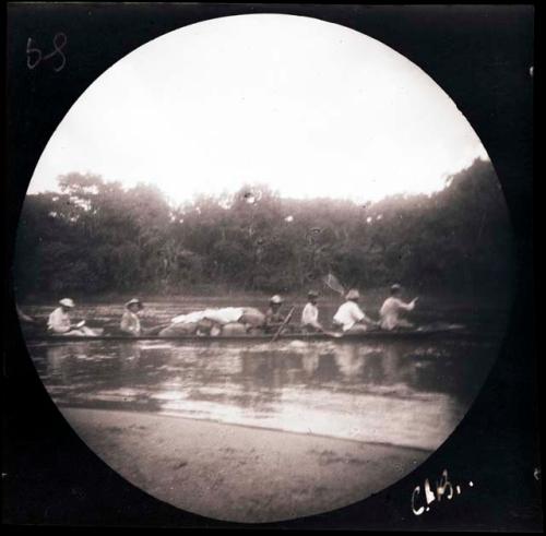 People canoeing on a river