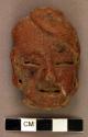 Ceramic figurines, human effigy heads, broken at neck, red ceramic