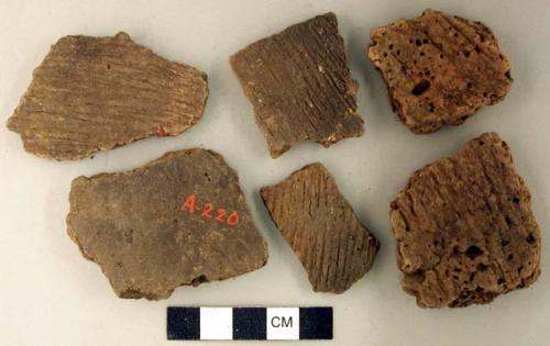 Ceramic, earthenware body and base sherds, including undecorated, incised, and cord-impressed designs