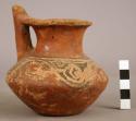 Red pottery jar with spout - polychrome