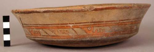 Shallow polychrome pottery bowl - broken