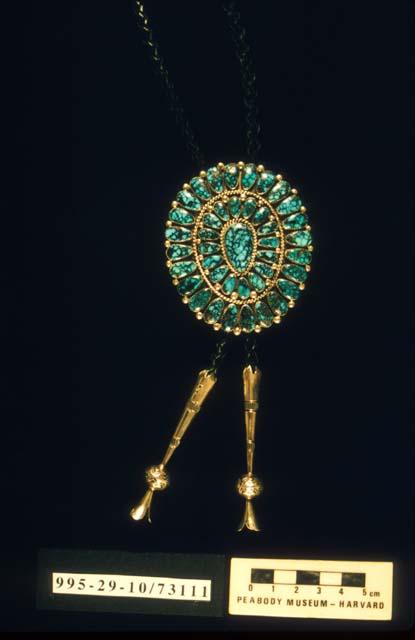 Sunburst bolo tie of silver and turquoise